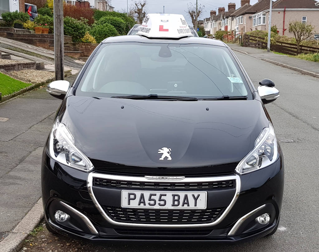 Photograph of red Peugeot 208 GT Line with licence plate PA55 BAY